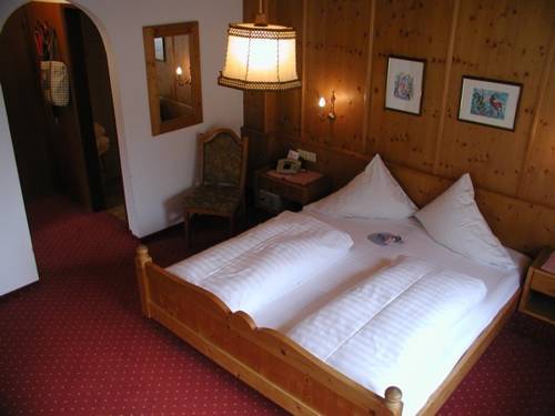 Imagen de la habitación del Hotel Alpin Family Resort Seetal. Foto 9