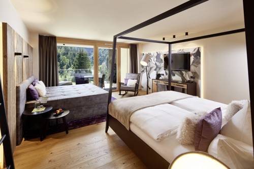 Imagen de la habitación del Hotel Alpin Life Resort Lürzerhof. Foto 6