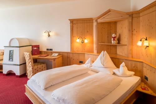 Imagen de la habitación del Hotel Alpin Panorama Hubertus. Foto 5