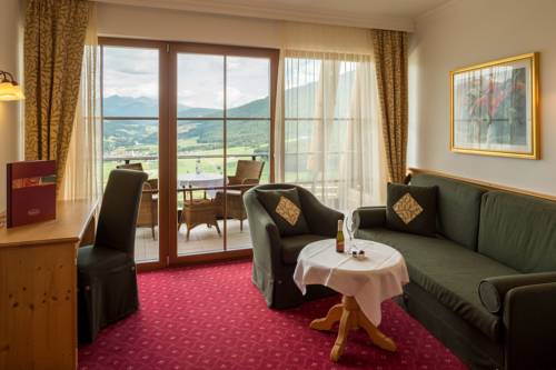 Imagen de la habitación del Hotel Alpin Panorama Hubertus. Foto 8