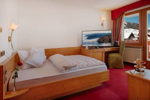 Imagen de la habitación del Hotel Alpin Royal Wellness Refugium and Resort. Foto 11