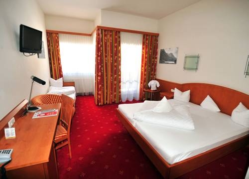 Imagen de la habitación del Hotel Alpin Scheffau. Foto 2