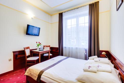 Imagen de la habitación del Hotel Alpin, Szczyrk. Foto 6