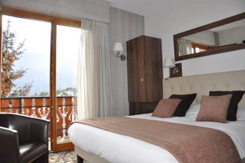 Imagen de la habitación del Hotel Alpina Lodge Vanoise. Foto 2