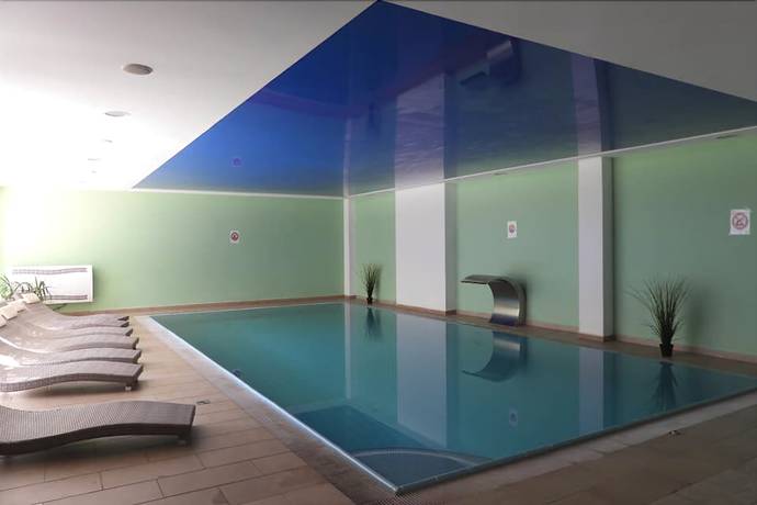 Imagen de la piscina del Hotel Alpina Mountain Resort. Foto 18
