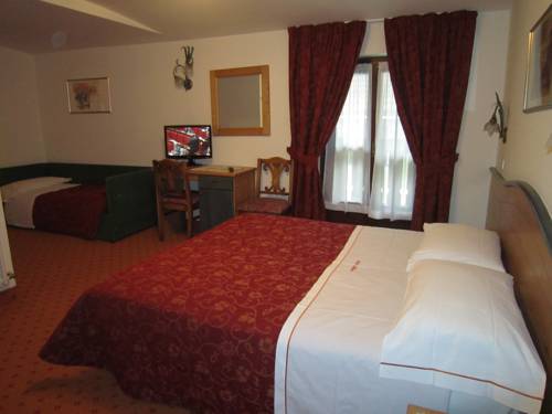 Imagen de la habitación del Hotel Alpina, Pinzolo. Foto 4