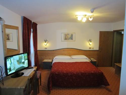 Imagen de la habitación del Hotel Alpina, Pinzolo. Foto 7