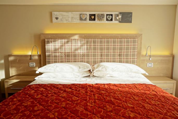 Imagen de la habitación del Hotel Alpina, Pinzolo. Foto 9