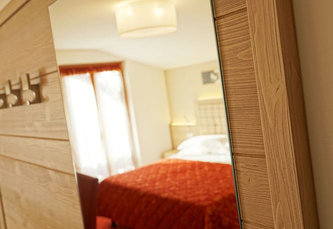 Imagen de la habitación del Hotel Alpina, Pinzolo. Foto 13