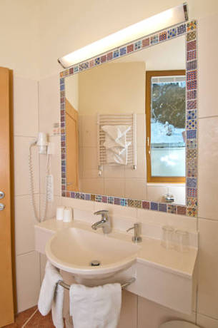 Imagen de la habitación del Hotel Alpina Wagrain. Foto 13