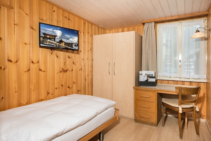 Imagen de la habitación del Hotel Alpina, Zermatt . Foto 9