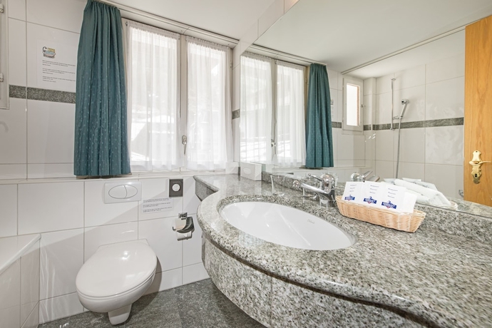 Imagen de la habitación del Hotel Alpina, Zermatt . Foto 14
