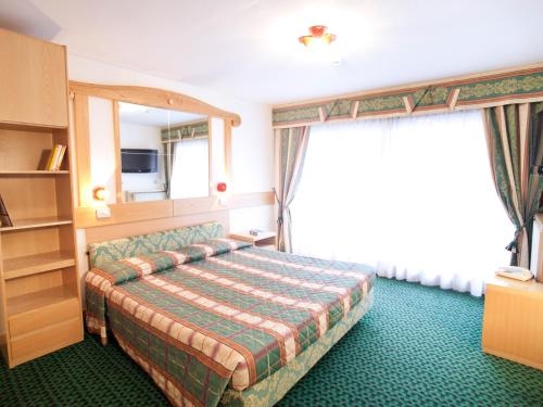 Imagen de la habitación del Hotel Alpine Charme and Wellness Europeo. Foto 5