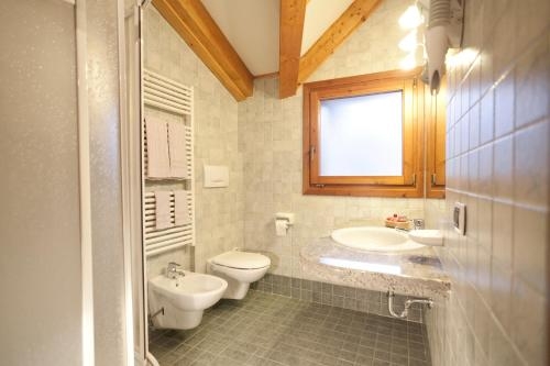 Imagen de la habitación del Hotel Alpine Charme and Wellness Europeo. Foto 8