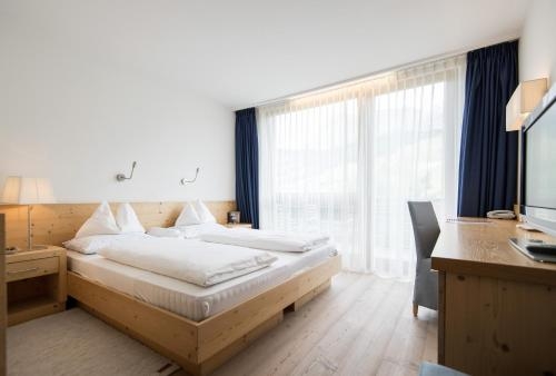 Imagen de la habitación del Hotel Alpine Ciasa Lara. Foto 7