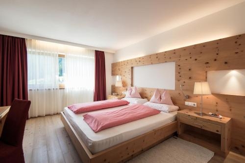 Imagen de la habitación del Hotel Alpine Ciasa Lara. Foto 8