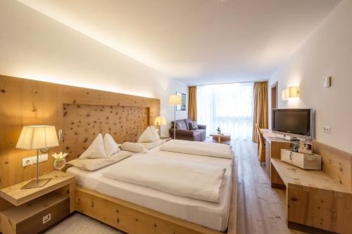 Imagen de la habitación del Hotel Alpine Ciasa Lara. Foto 10