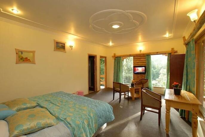 Imagen de la habitación del Hotel Alpine Club, Nainital. Foto 15
