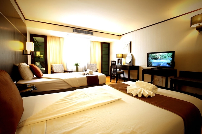 Imagen de la habitación del Hotel Alpine Golf Resort Chiang Mai. Foto 8