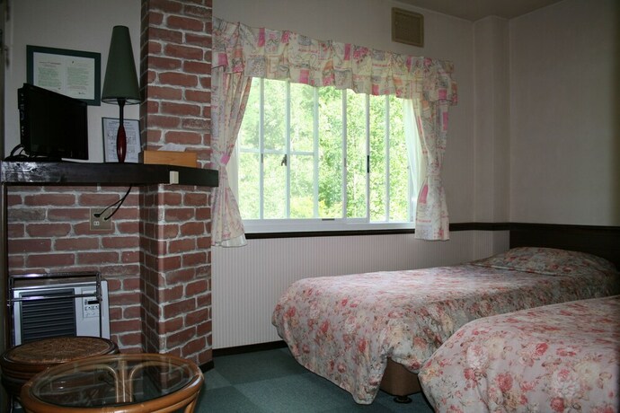 Imagen de la habitación del Hotel Alpine Inn Mizushiro. Foto 21