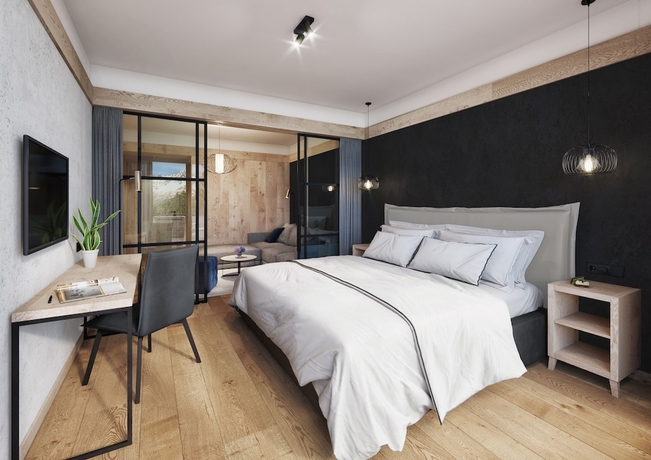 Imagen de la habitación del Hotel Alpine Resort Sportalm. Foto 9