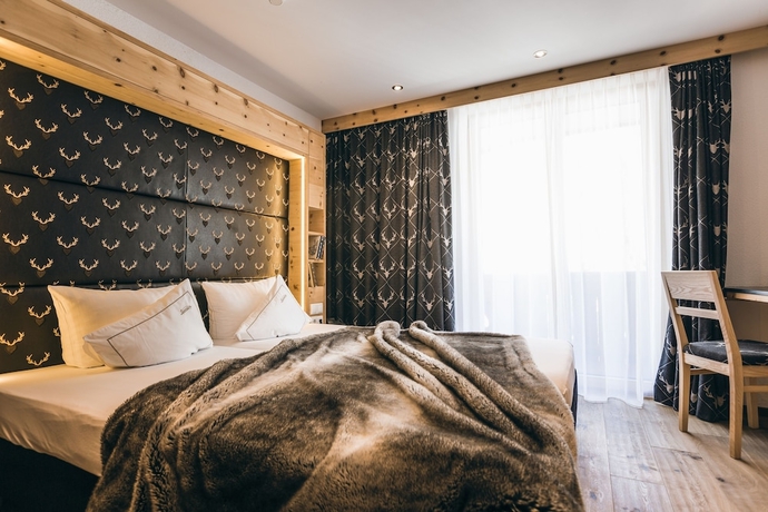 Imagen de la habitación del Hotel Alpine Resort Sportalm. Foto 11