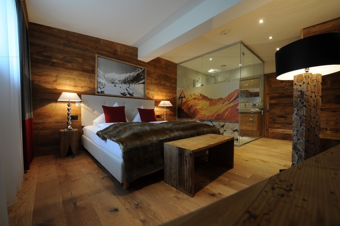 Imagen de la habitación del Hotel Alpine Resort Sportalm. Foto 17