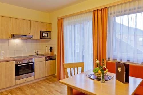 Imagen de la habitación del Hotel Alpine Spa Residence. Foto 14