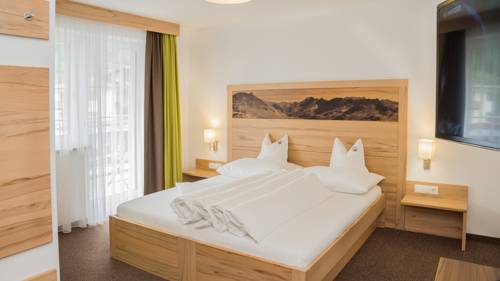 Imagen de la habitación del Hotel Alpinhotel Monte Superior. Foto 9