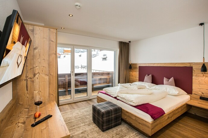 Imagen de la habitación del Hotel Alpinium. Foto 22