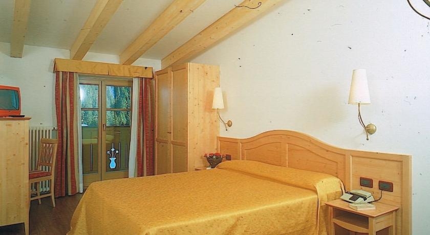 Imagen de la habitación del Hotel Alpino Al Cavalletto. Foto 3
