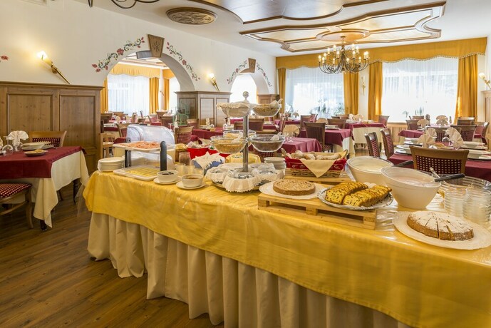 Imagen del bar/restaurante del Hotel Alpino Family Wellness. Foto 18