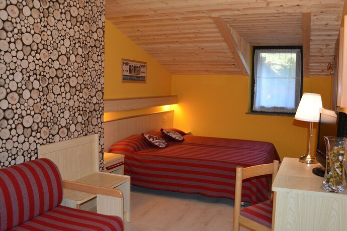 Imagen de la habitación del Hotel Alpino Family Wellness. Foto 22