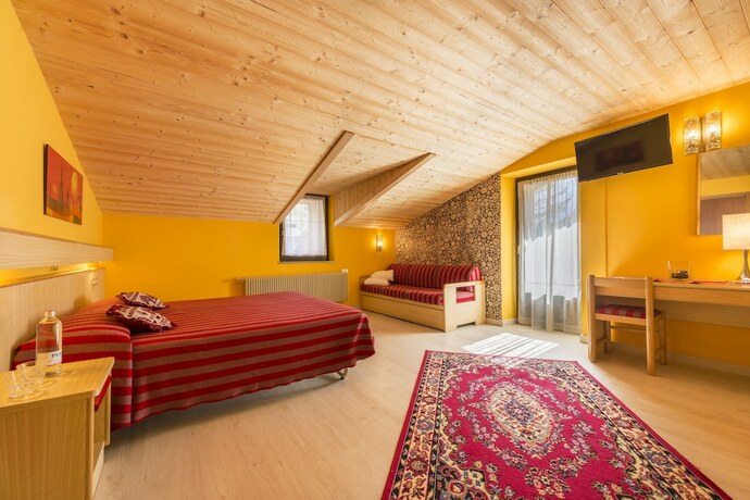 Imagen de la habitación del Hotel Alpino Family Wellness. Foto 26