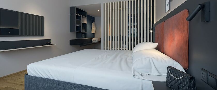 Imagen de la habitación del Hotel Alpstadt Lifestyle. Foto 20