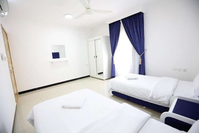 Imagen de la habitación del Hotel Alrayyan Apartments. Foto 2