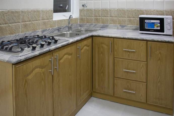 Imagen de la habitación del Hotel Alrayyan Apartments. Foto 7