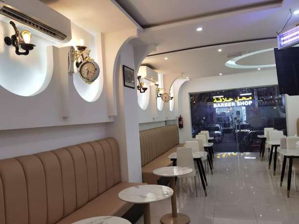 Imagen de la habitación del Hotel Alrayyan Apartments. Foto 11