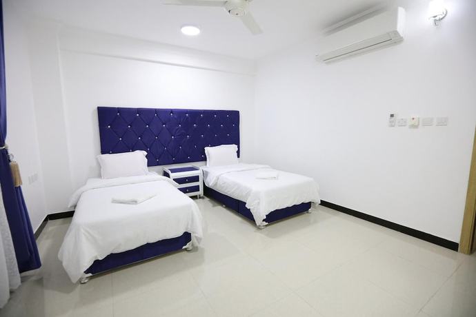 Imagen de la habitación del Hotel Alrayyan Apartments. Foto 12