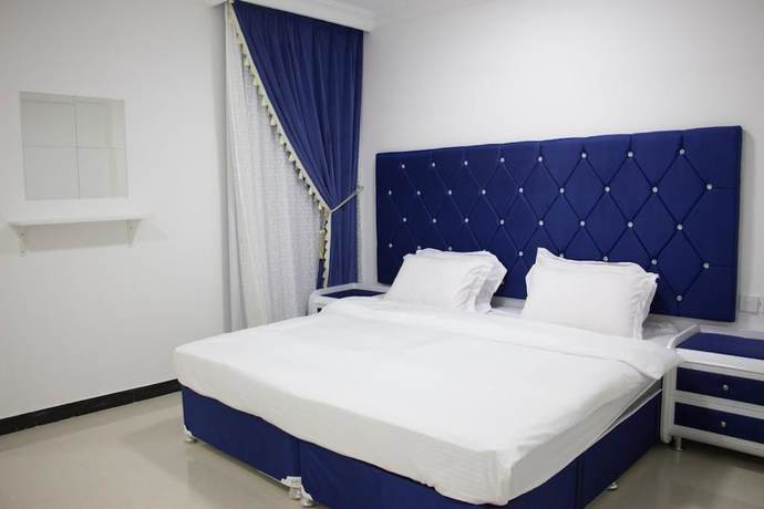 Imagen de la habitación del Hotel Alrayyan Apartments. Foto 13
