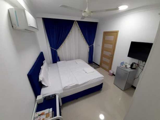 Imagen de la habitación del Hotel Alrayyan Apartments. Foto 14