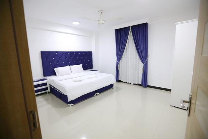 Imagen de la habitación del Hotel Alrayyan Apartments. Foto 16