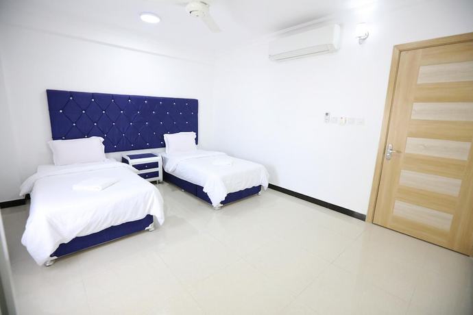 Imagen de la habitación del Hotel Alrayyan Apartments. Foto 18