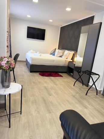 Imagen de la habitación del Hotel Alsago Lux. Foto 4