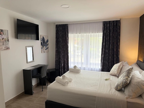 Imagen de la habitación del Hotel Alsago Lux. Foto 5