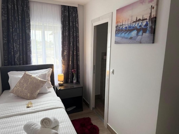 Imagen de la habitación del Hotel Alsago Lux. Foto 8