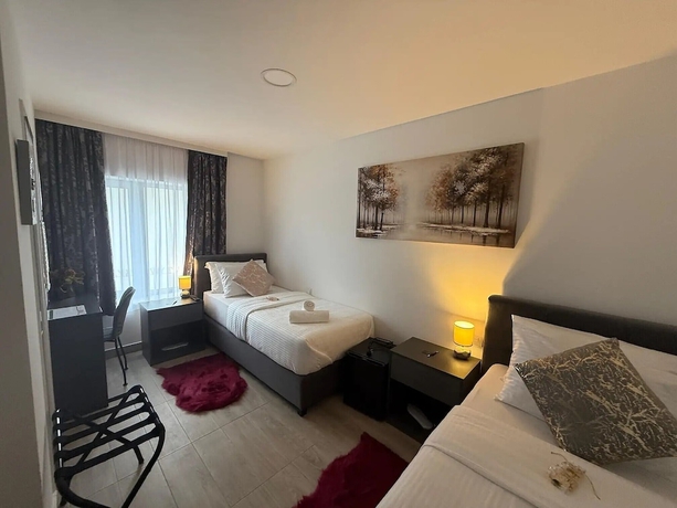 Imagen de la habitación del Hotel Alsago Lux. Foto 9