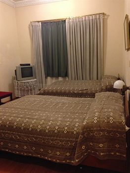Imagen de la habitación del Hotel Alston Inn. Foto 4