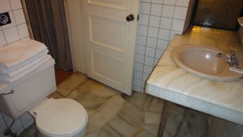 Imagen de la habitación del Hotel Alston Inn. Foto 9