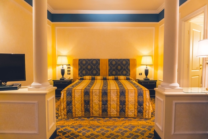Imagen de la habitación del Hotel Altafiumara Resort and Spa. Foto 4